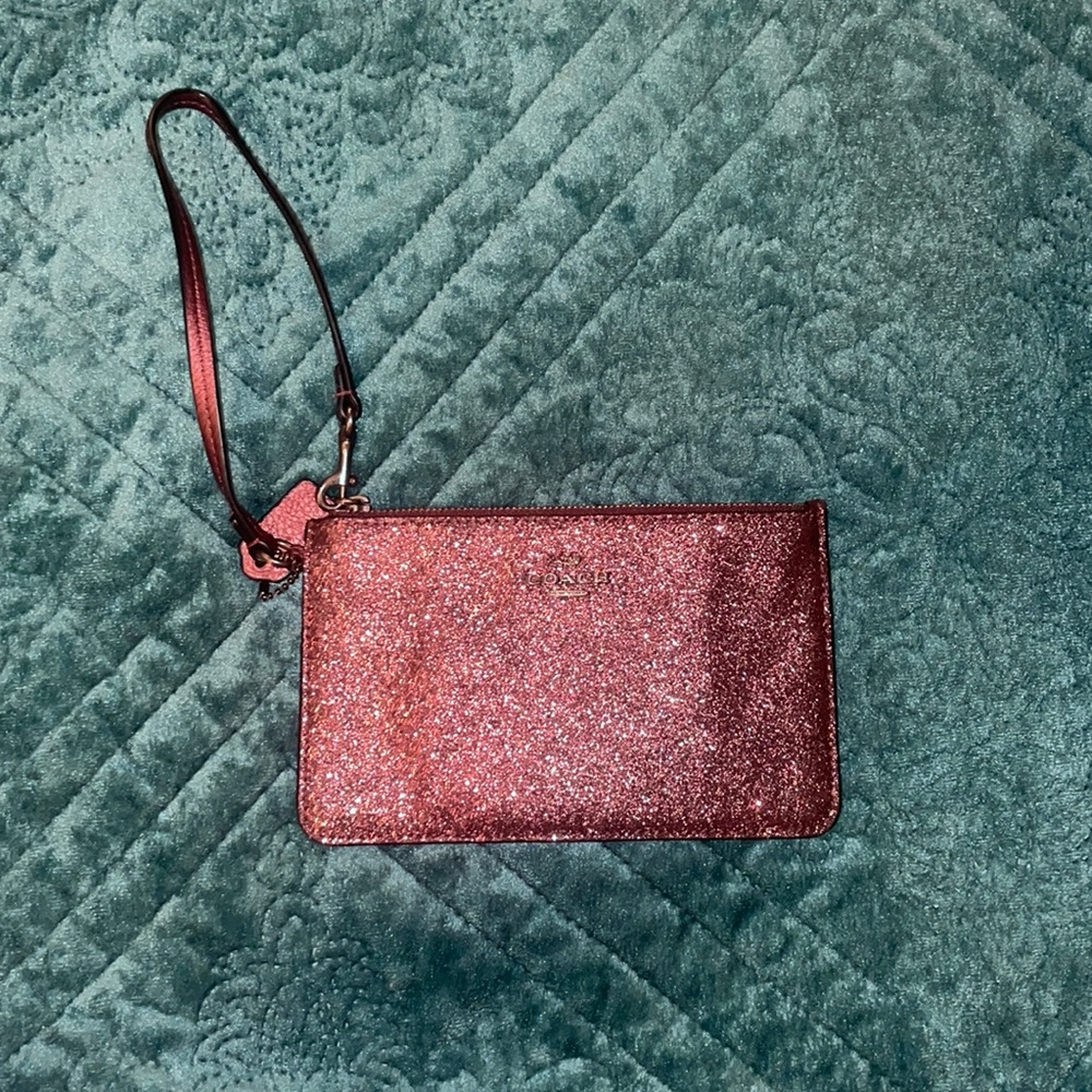 Dark purple Coach wristlet